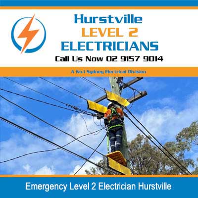 Emergency Level 2 Electrician repairing a power line while secured high on a power pole in Hurstville